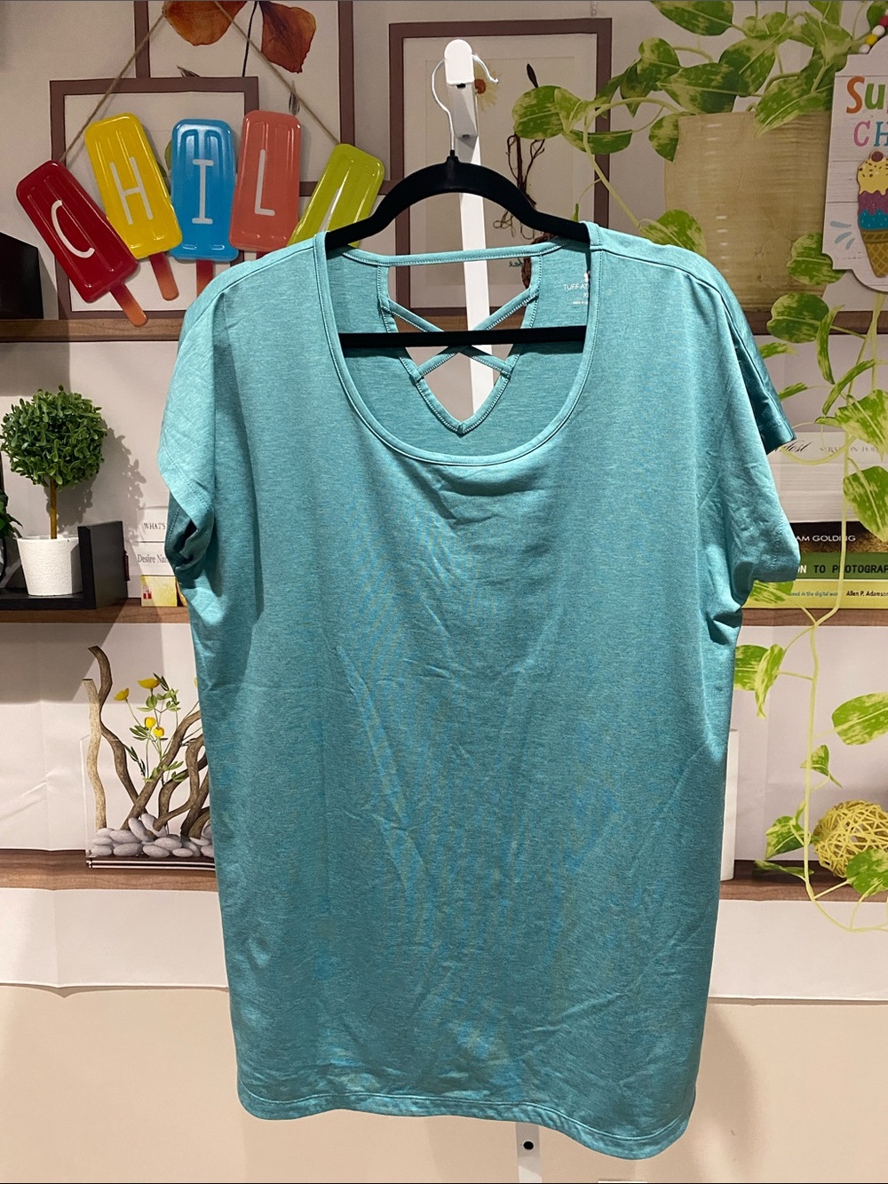 Tuff Athletics Teal Short-Sleeve Top with Crisscross Back XL. Ptp is 23